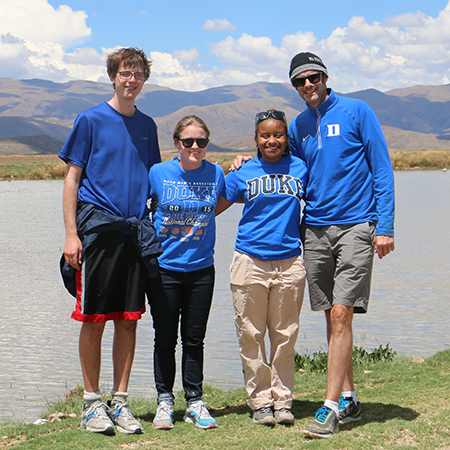 Duke students pause while taken air samples in Bolivia.