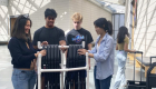 First-year engineering students Rania Challita, Ahnaf Hossain, Liam Byrne, Ashley Huang, with their prototype at the Nasher Museum of Art at Duke University.