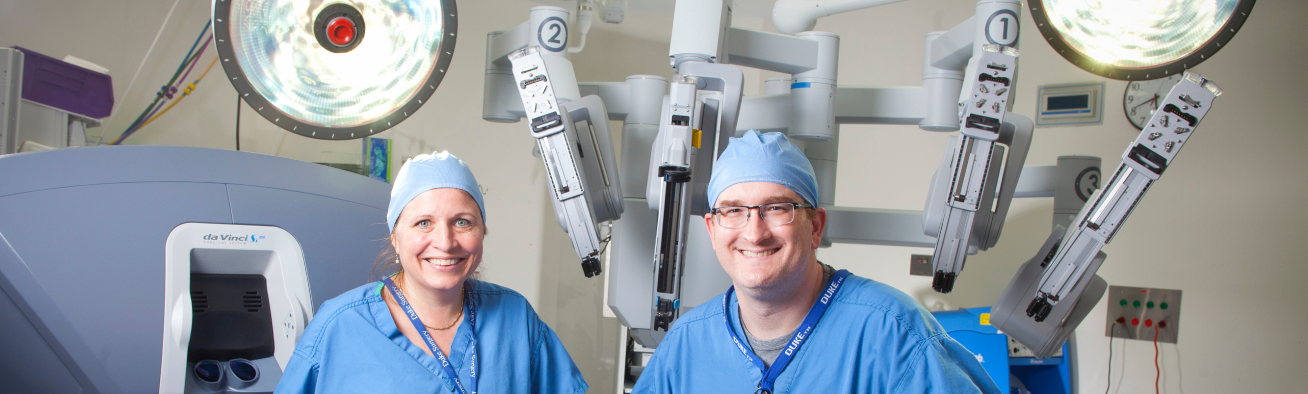 Colorectal surgeons Linda Farkas and Ben Hopkins perform robotic surgeries at Duke Raleigh Hospital.
