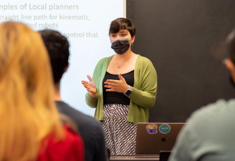 a university instructor teaches a class