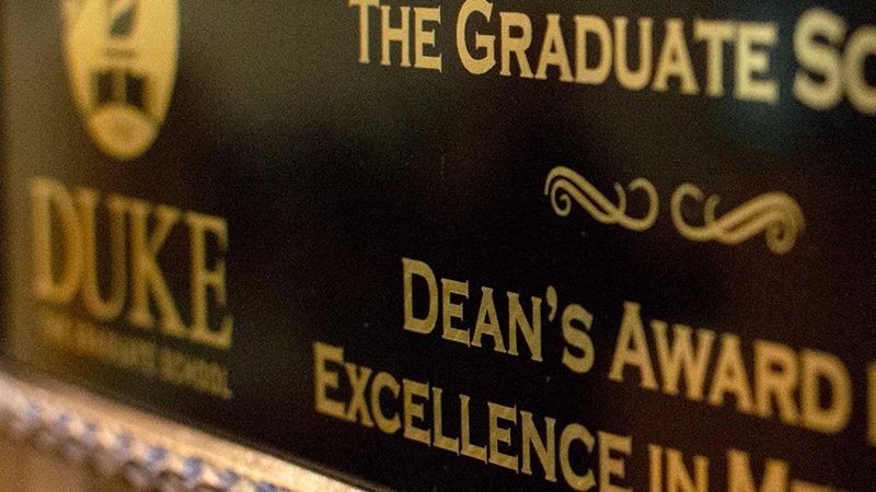 A gold and black plaque