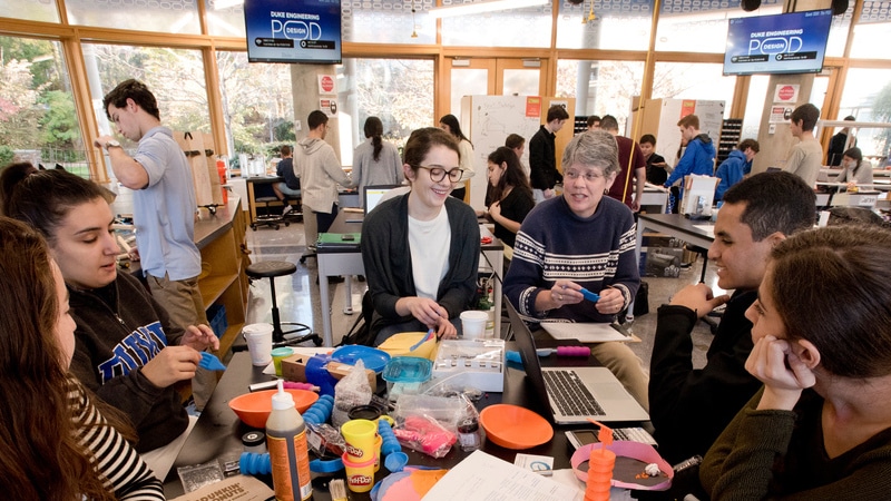 students gather in an undergraduate maker space at a university